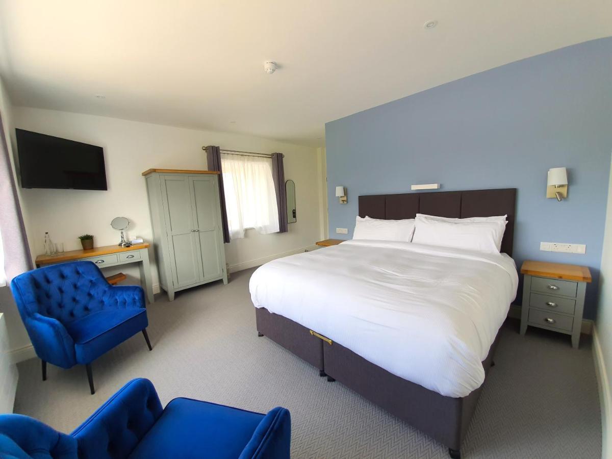 Dingle Garden Townhouse Bed and Breakfast Exteriör bild A bedroom at The Old Mill